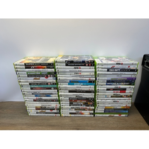 678 - A box containing four Xbox 360 consoles and games to include FIFA 12, Bulletstorm and Fallout New Ve... 