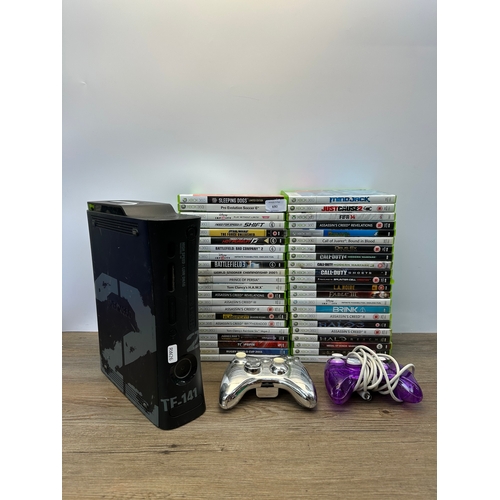 690 - A Microsoft Xbox 360 250GB limited edition Call of Duty MW2 JTF-141 console and games to include FIF... 