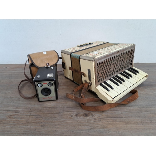 732 - Two items, one Hohner Student I eight bass piano accordion and one cased Kodak Brownie Flash III box... 