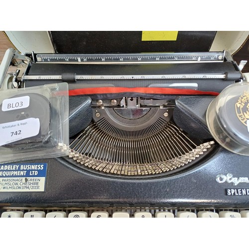 739 - Two cased vintage portable typewriters, one Olympia Splendid 66 and one Olivetti Lettera 22 with ins... 