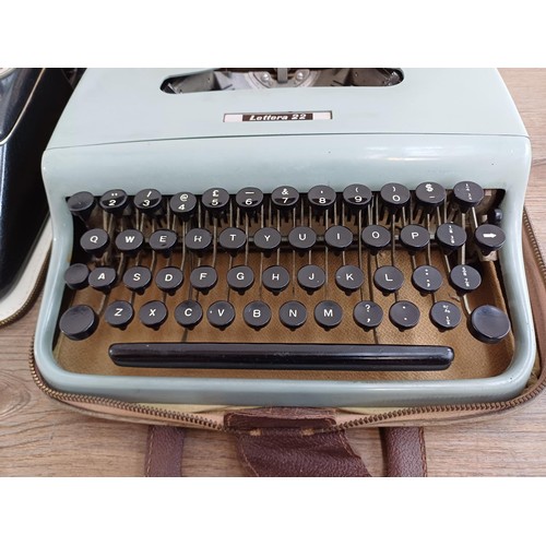 739 - Two cased vintage portable typewriters, one Olympia Splendid 66 and one Olivetti Lettera 22 with ins... 