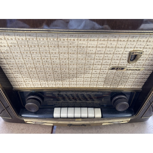 647 - A mid 1950s Grundig 2043W/3D MKII six-valve four-band three-speaker tabletop radio with cloth cover