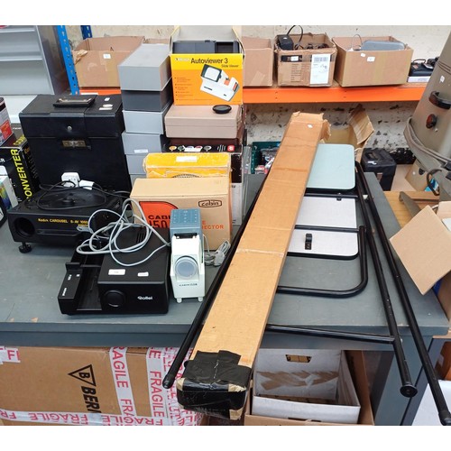 630 - A large collection of slide equipment to include Rollei P355 Automat projector, boxed Cabin 150M pro... 