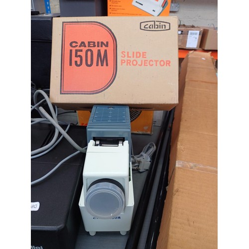 630 - A large collection of slide equipment to include Rollei P355 Automat projector, boxed Cabin 150M pro... 