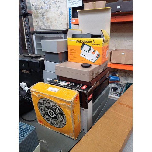 630 - A large collection of slide equipment to include Rollei P355 Automat projector, boxed Cabin 150M pro... 