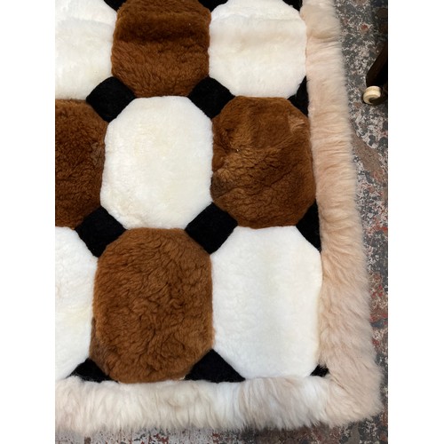 14 - An Alpaca fur rug - approx. 140cm x 108cm