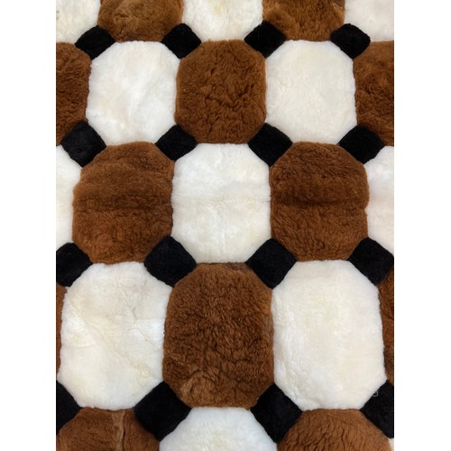 14 - An Alpaca fur rug - approx. 140cm x 108cm