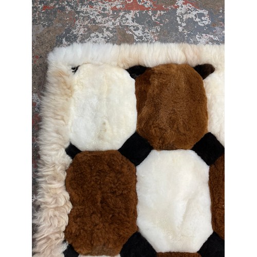 14 - An Alpaca fur rug - approx. 140cm x 108cm