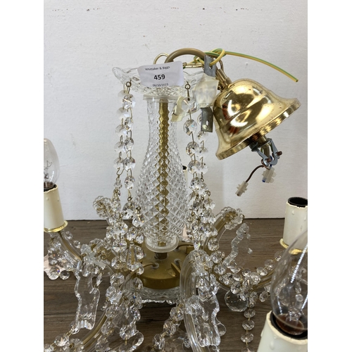 555 - A vintage cut glass five branch chandelier