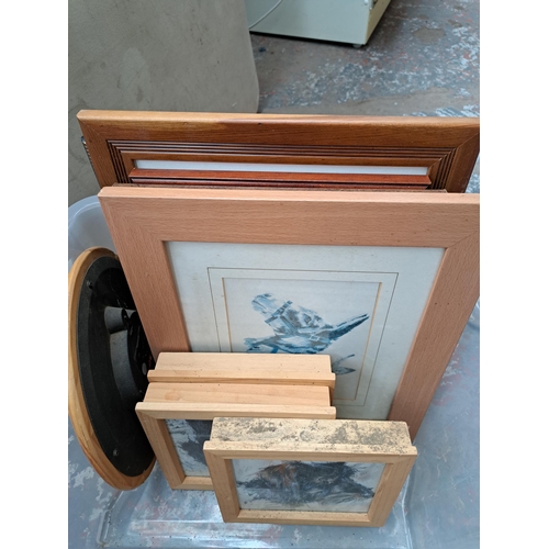 912 - A box containing framed pictures to include Pat Howden By The Pond Hartington pencil signed numbered... 