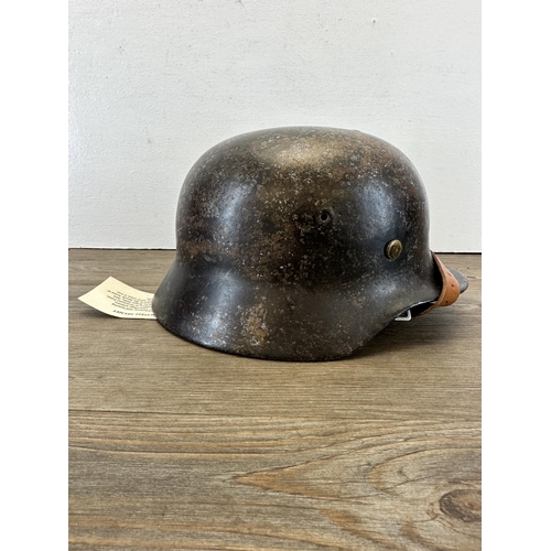 534 - A WWII German M40 steel helmet