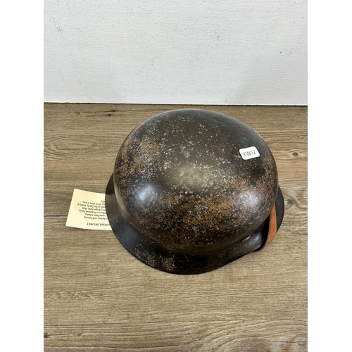 534 - A WWII German M40 steel helmet