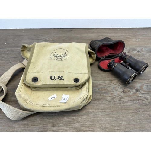 538 - Two items, American USAAF canvas bag and a pair of antique leather cased binoculars