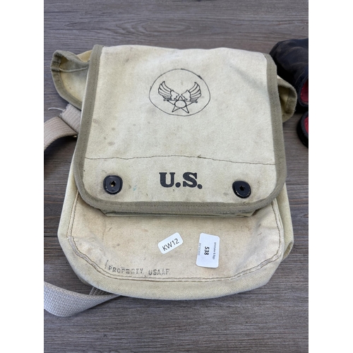 538 - Two items, American USAAF canvas bag and a pair of antique leather cased binoculars