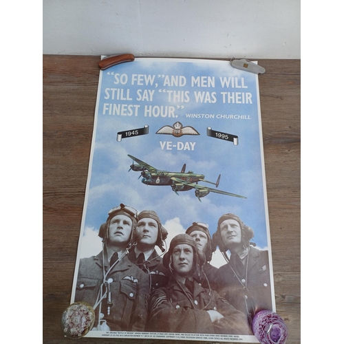 711A - A collection of The Beatles calendars and posters to include 'Victory Times Square 1945', 'Area 51 K... 