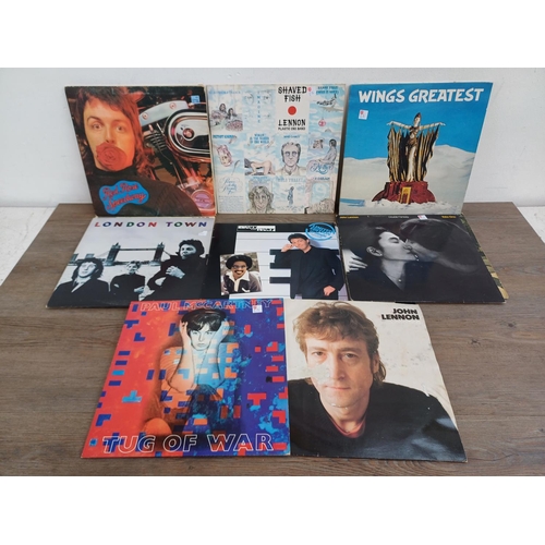 724 - A collection of The Beatles and related vinyl records to include 'A Hard Day's Night' (mono), 'Pleas... 