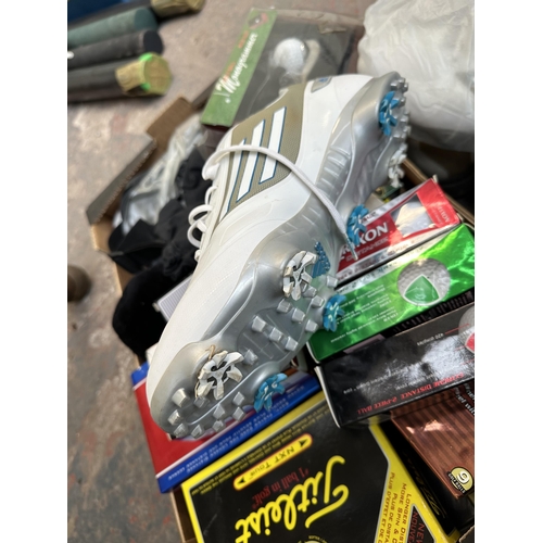 794 - A collection of golfing equipment to include boxed balls, pair of Adidas AdiZero size 9 shoes etc.