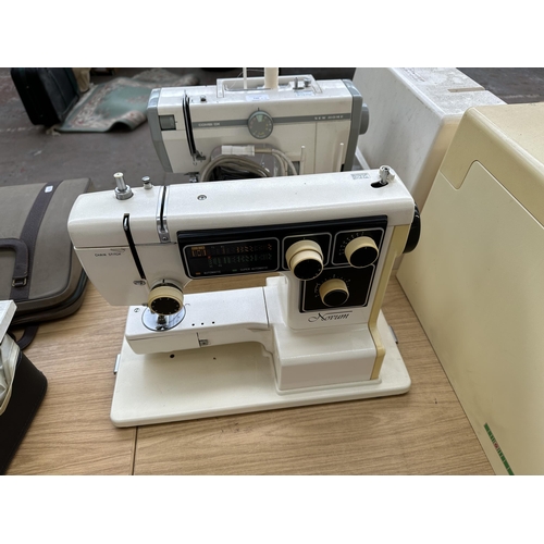 740 - Two cased Janome electric sewing machines, one New Home Combi DX model 502 and one Novum model 500 (... 