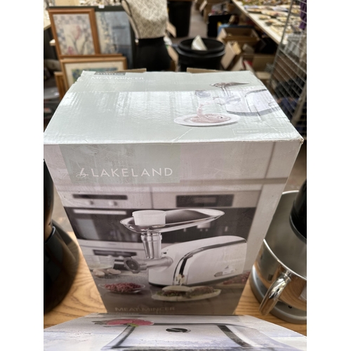 747 - Five boxed items to include Cuisinart ice cream maker, Russell Hobbs hand mixer, Lakeland meat mince... 