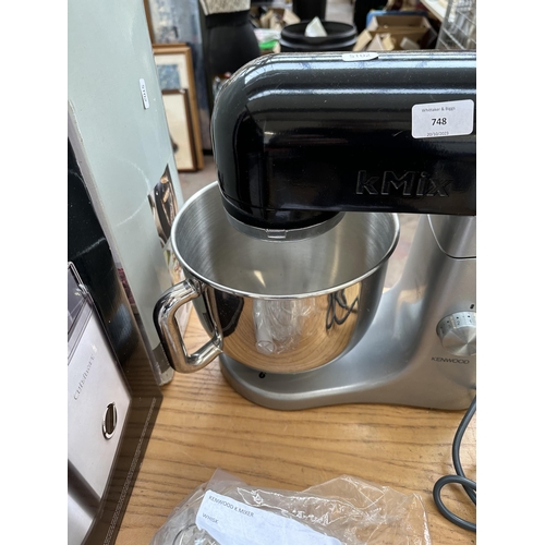 748 - A Kenwood kMix KMX50 stand mixer with bowl, attachments and instruction manual