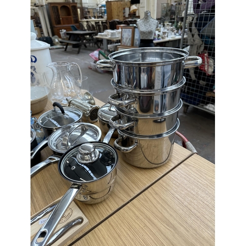 750 - A very large collection of kitchenware and serveware to include Mason Cash mixing bowl, Circulon, Li... 