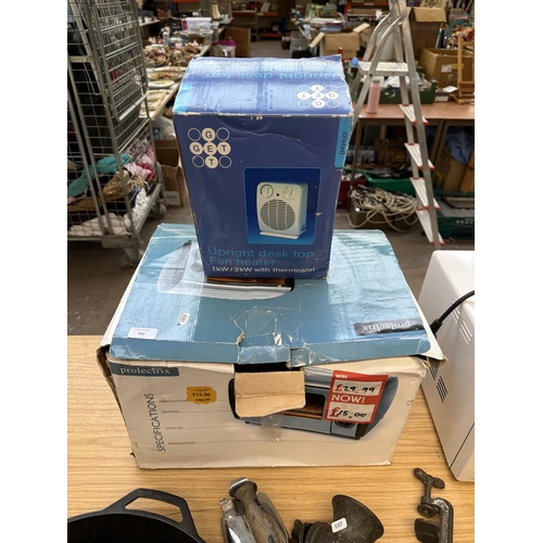 751 - Two boxed items, one Prolectrix infrared oven and one GET upright desktop fan heater