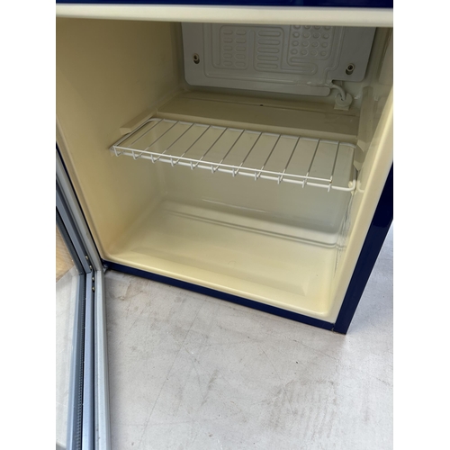 755 - A Husky KN13 countertop drinks fridge with Tetley's branding