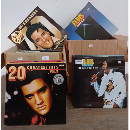 709 - Two boxes containing a large collection of LP vinyl records to include sixteen Elvis Presley, Rod St... 