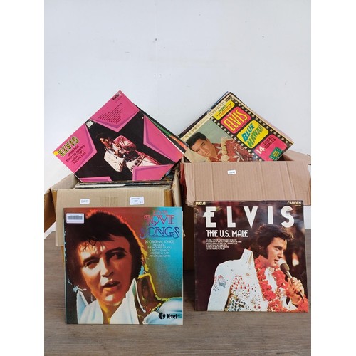 709 - Two boxes containing a large collection of LP vinyl records to include sixteen Elvis Presley, Rod St... 