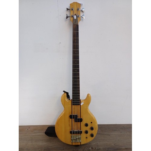 731 - A 1970s Kay neck-through four-string electric bass guitar with strap - made in Japan