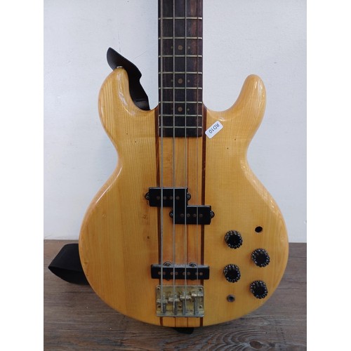 731 - A 1970s Kay neck-through four-string electric bass guitar with strap - made in Japan