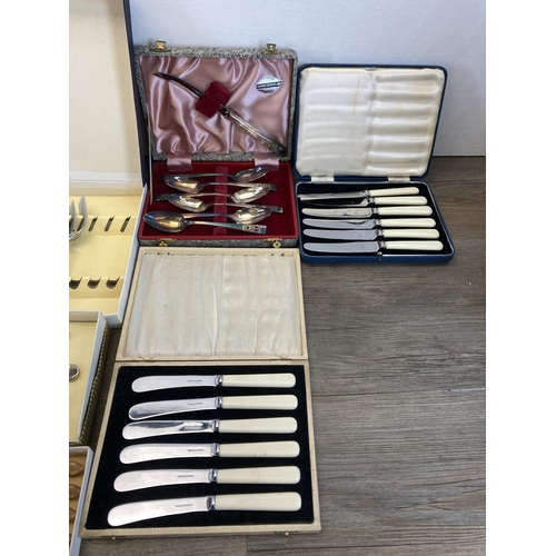 326 - Eleven vintage cased cutlery sets