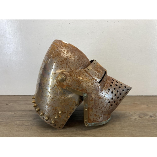 330 - A medieval style shaped metal reenactment helmet