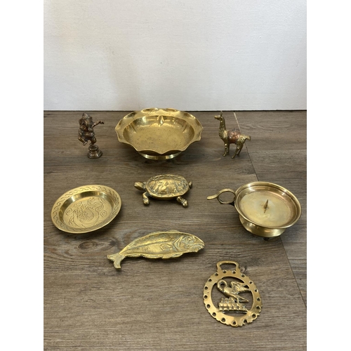 335 - A collection of copper and brassware to include a pair of 25cm brass candlesticks, brass table lamp,... 