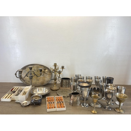 337 - A collection of metalware to include mid 20th century silver plated three branch candelabra, vintage... 