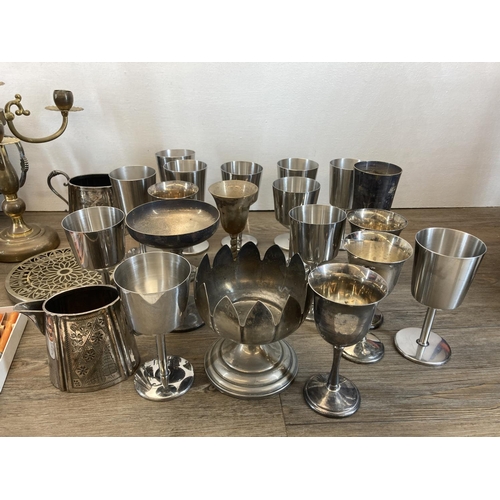 337 - A collection of metalware to include mid 20th century silver plated three branch candelabra, vintage... 