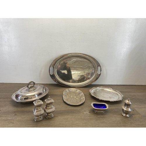 341 - A collection of EPNS to include Plato oval two handled serving tray, Victorian oval lidded serving d... 