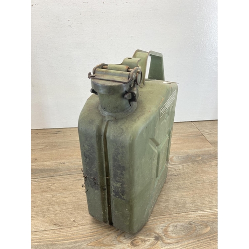 344 - Two items, one bundle of brick ties and one vintage 5L green painted jerry can - approx. 31cm high x... 