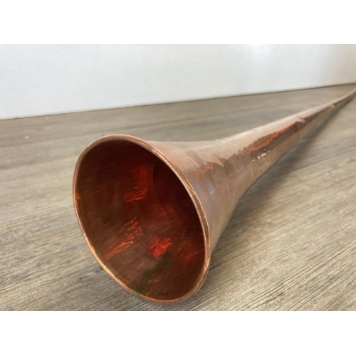 350 - An antique copper and brass hunting horn - approx. 136cm long