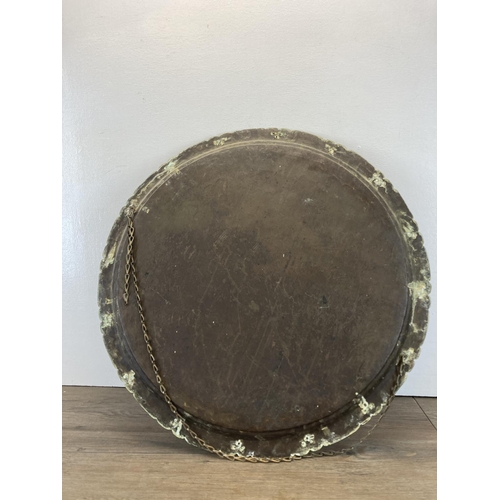 356 - A Middle Eastern engraved brass charger - approx. 61cm diameter