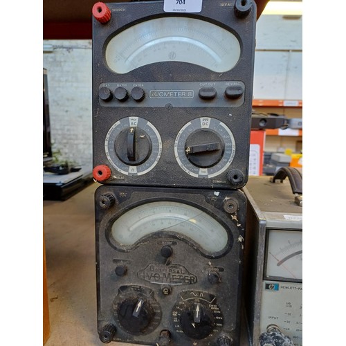 704 - Four items, one Hewlett-Packard voltmeter, two AVO Ltd. AVOmeter multimeters and one boxed pocket vo... 