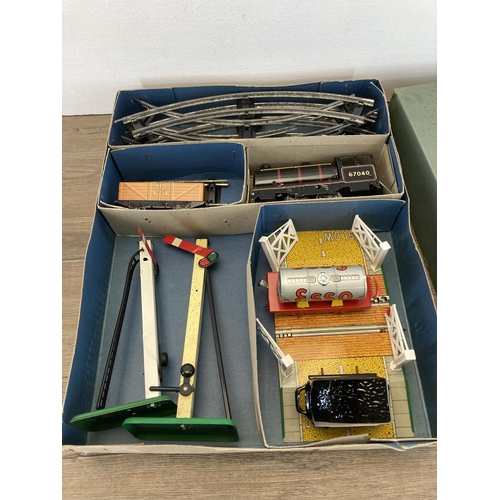 377 - A mid 20th century boxed Lewis's goods tin plate train set - no. 320