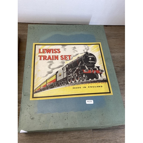 377 - A mid 20th century boxed Lewis's goods tin plate train set - no. 320