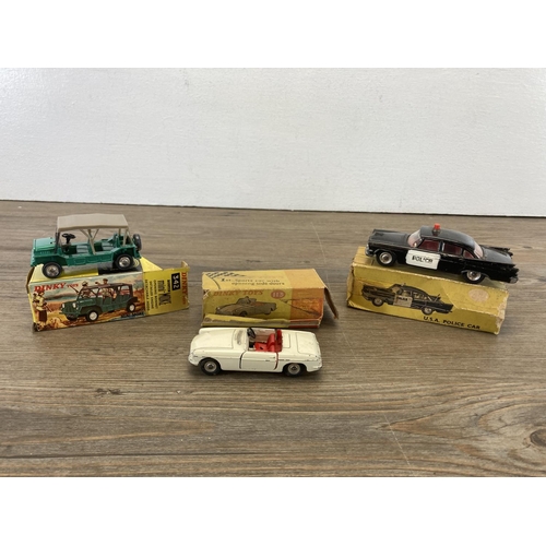 381 - Ten mid 20th century boxed Dinky diecast model vehicles, U.S.A. Police Car - no. 258, M.G.B. Sports ... 