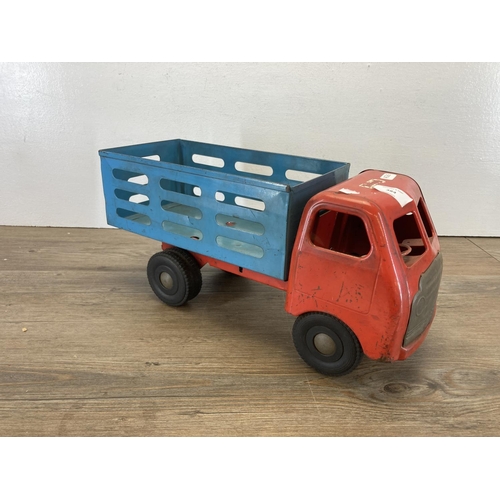 384 - A mid 20th century Tri-ang pressed steel Diesel Series Milk Lorry with red cab - approx. 19cm high x... 