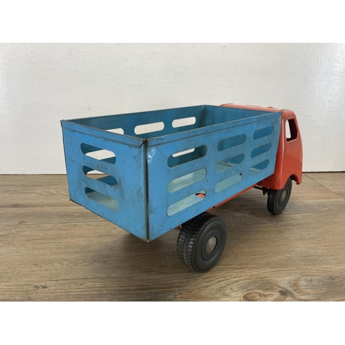 384 - A mid 20th century Tri-ang pressed steel Diesel Series Milk Lorry with red cab - approx. 19cm high x... 