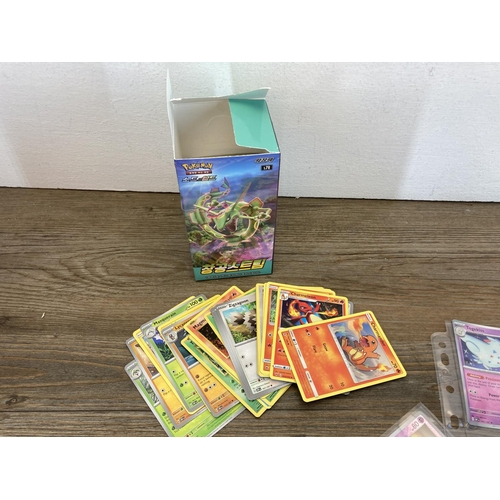 388 - A collection of Pokémon trading cards to include Japanese examples