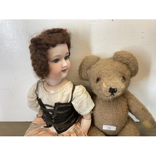 392 - Four items, mid 20th century articulated teddy bear, Cellose no. 2 hand painted doll, Pedigree doll ... 