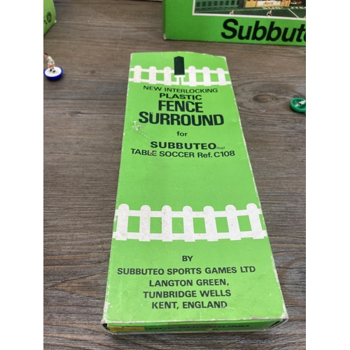 395 - A collection of vintage Subbuteo accessories to include Tournament Goals - no. C154, Work Cup Goals,... 