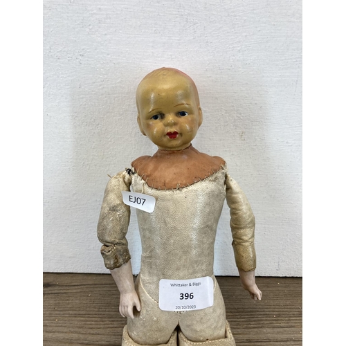 396 - A vintage articulated doll - approx. 35cm long